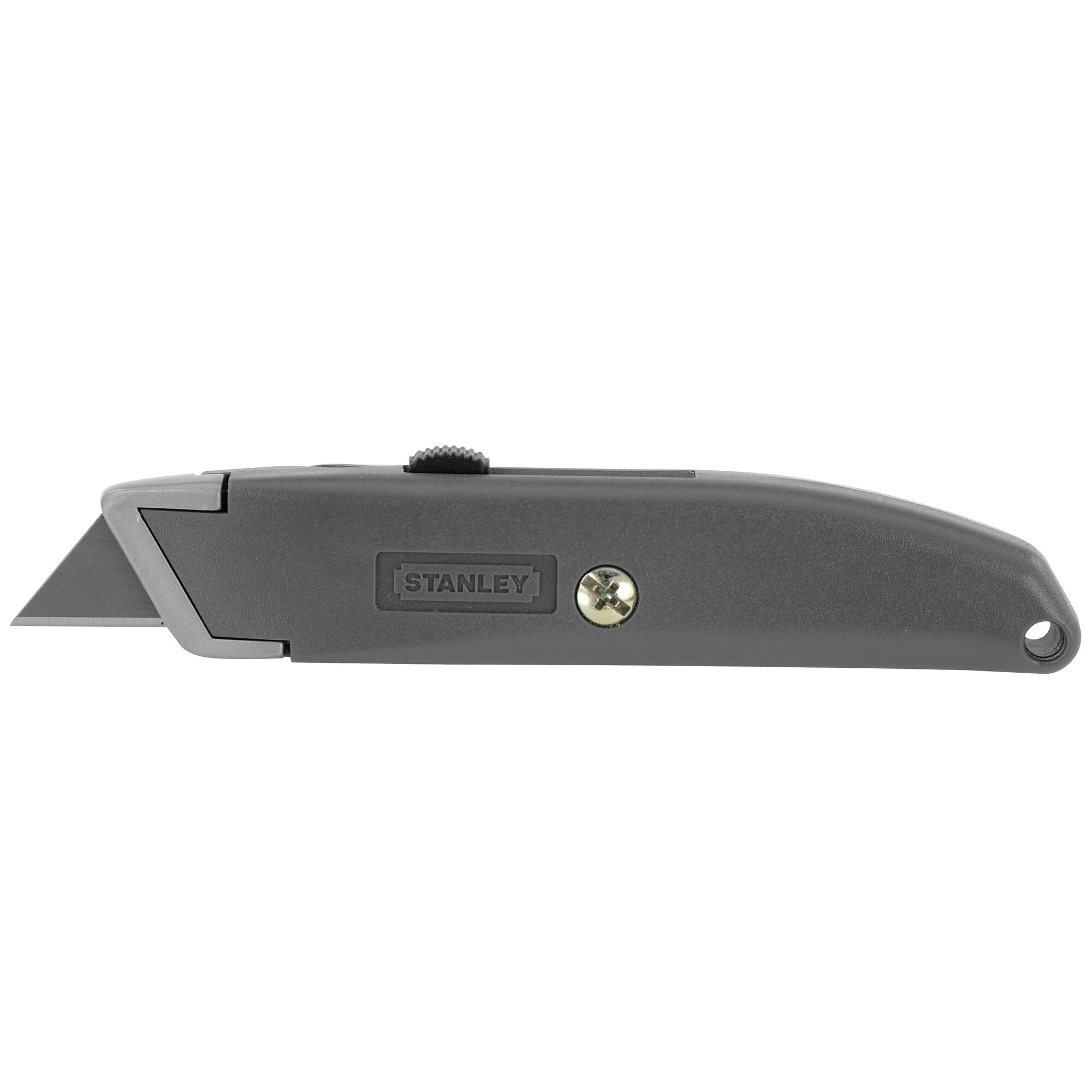 Stanley utility knife in gray, side view on white background, with exposed metal blade and thumb slider